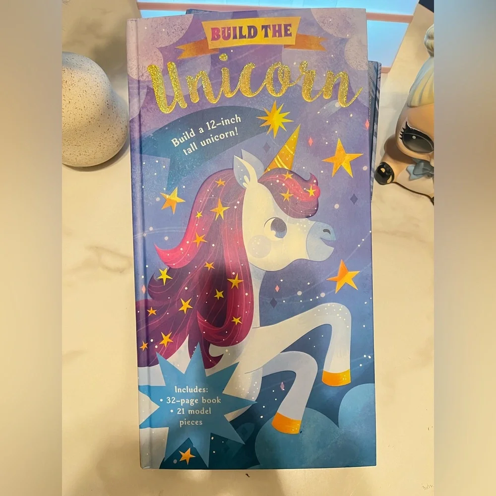 Build the Unicorn Kids Building Set, reading book, and Lear